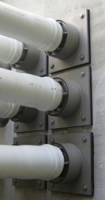 wall-sleeves-outside-mount-cluster-pipes-through-wall